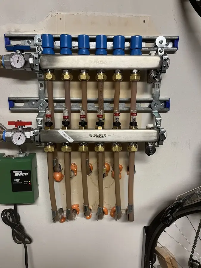 Plumber performing Gas Leak Detection at a residential property in Guilderland